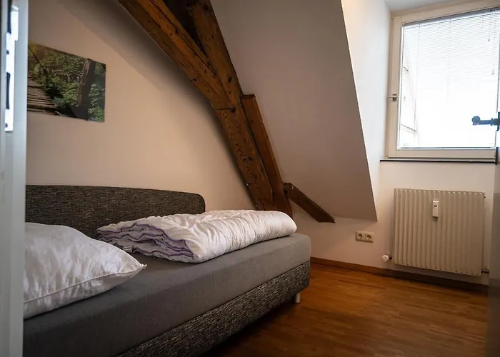 Grosse Dachgeschosswohnung Im Herzen Von